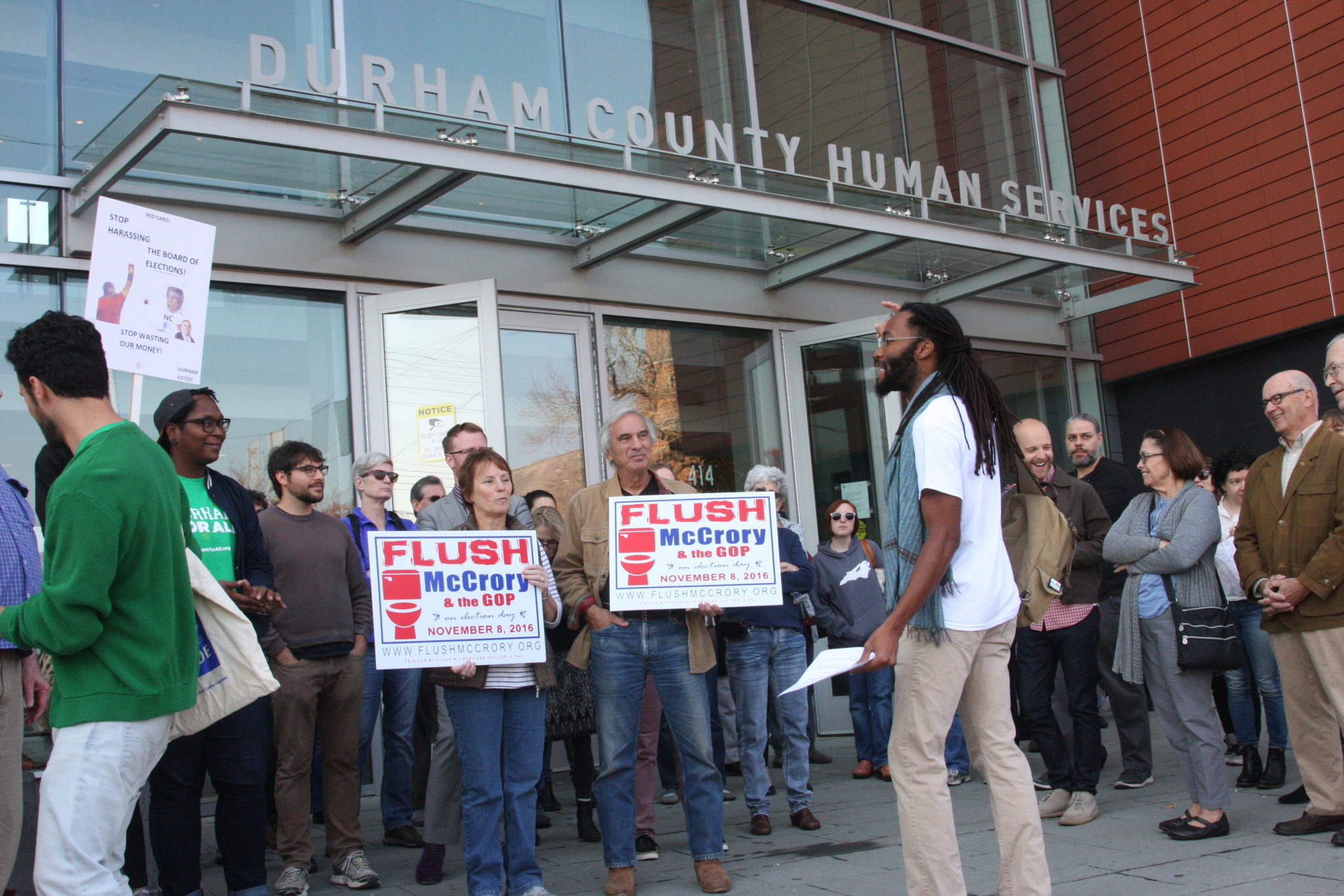 Durham in Defiance, a group opposing the election of President-elect Donald Trump, organized a demonstration Friday morning outside the Durham County Board of Elections hearing. (CJ photo by Dan Way)