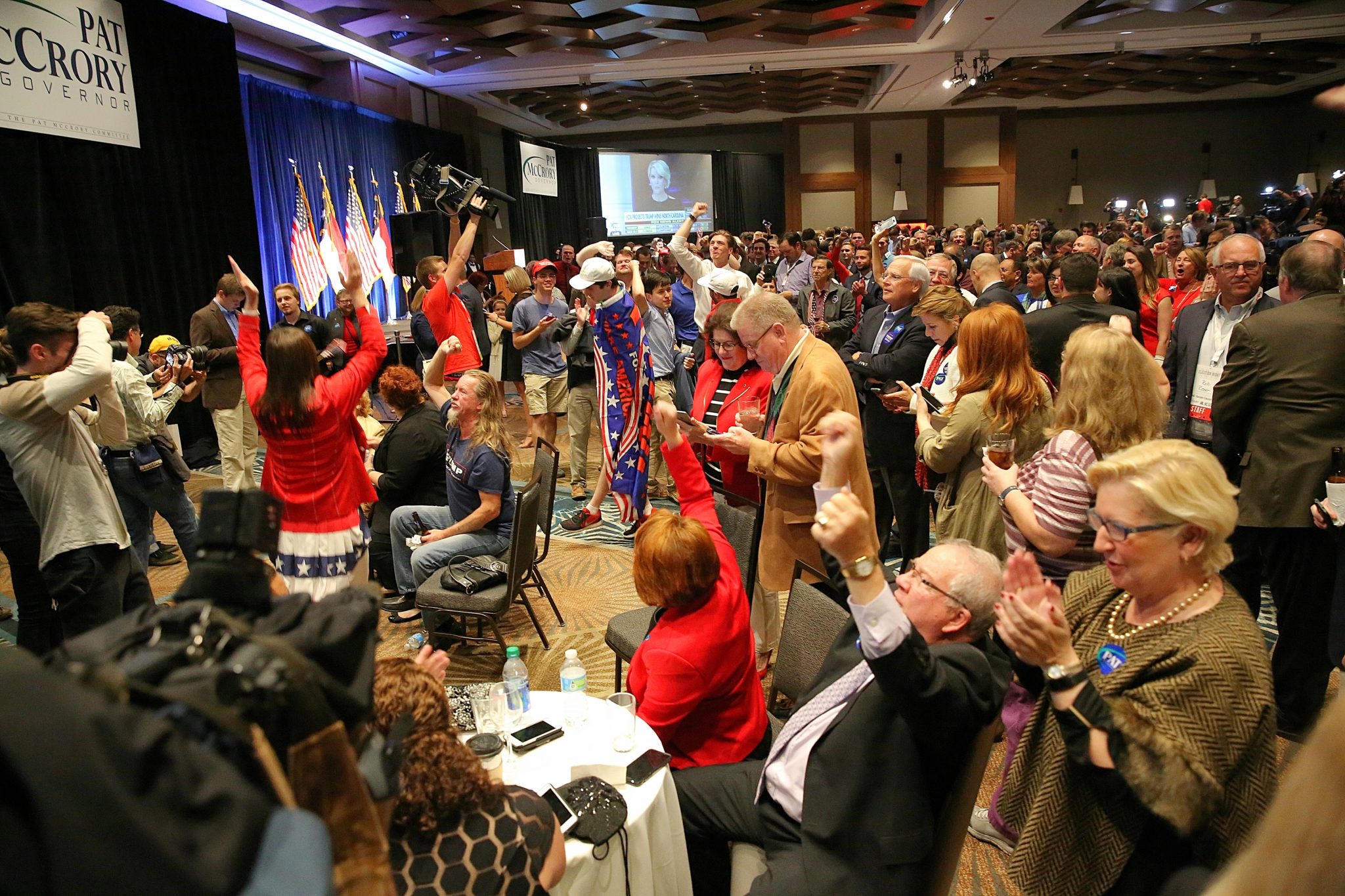 At the Republican victory party in Raleigh, supporters cheer the moment North Carolina was called for Donald Trump in the presidential race. (CJ photo by Don Carrington)
