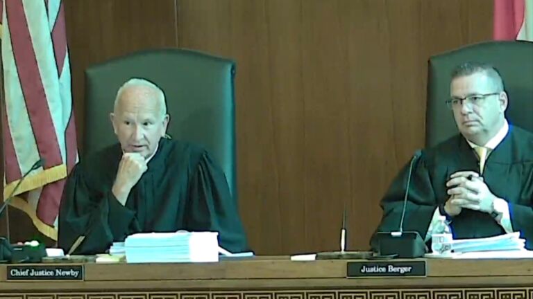 Chief Justice Paul Newby and Justice Phil Berger Jr. on the bench at the North Carolina Supreme Court