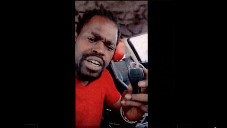 Christopher Carnes displays alleged pipe bomb detonator in Facebook video screen shot