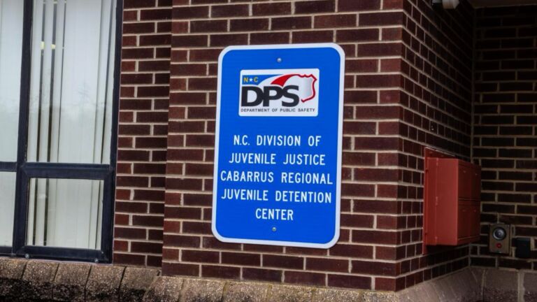 Cabarrus Regional Juvenile Detention Center sign on brick wall