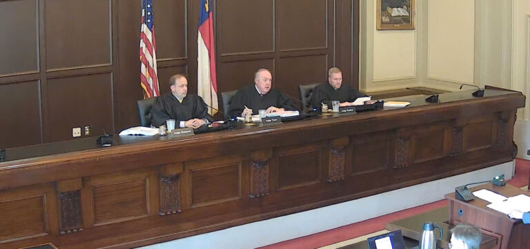 Judges Tobias Hampson, John Tyson, and Michael Stading hear oral arguments at the North Carolina Court of Appeals.